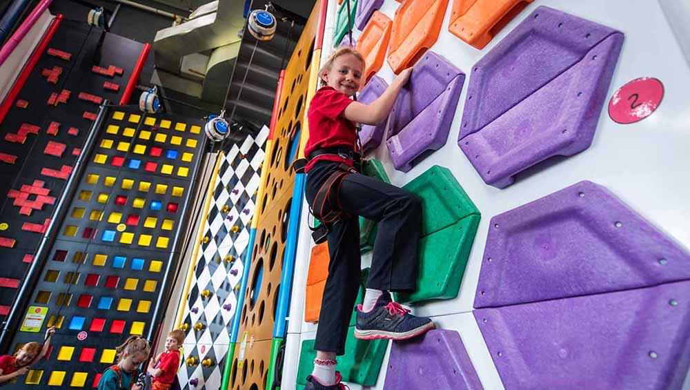 Auto Belays and climbing wall systems for climbing gyms, family entertainment centers, adventure camps, and more